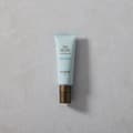 balení denního krému The Recipe Day Cream na šedém podkladu